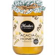 A jar of raw acacia honey freshly, this is the best Hungarian natural runny honey.
