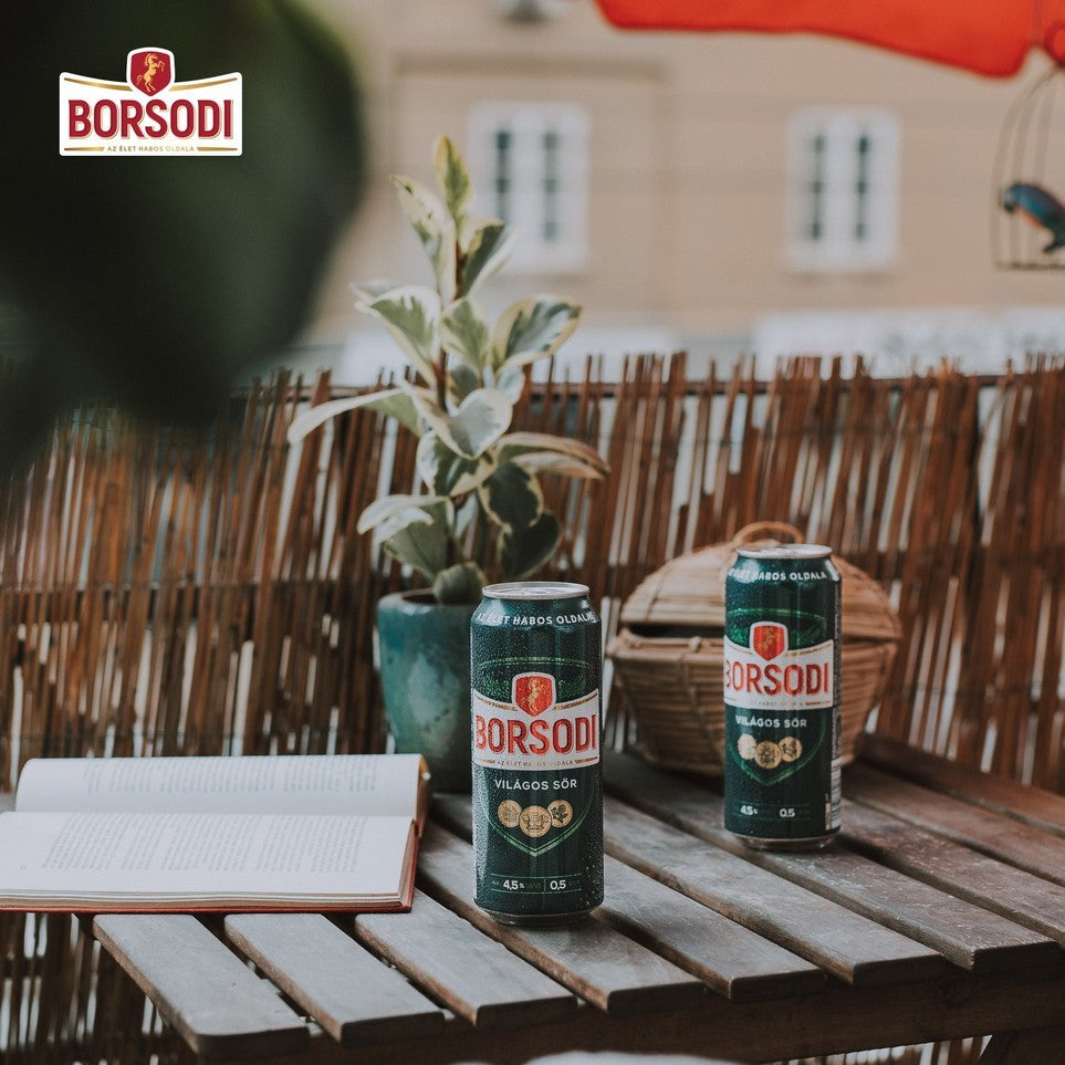 Cans of Borsodi beer, a pilsner-style light lager from the best-selling Hungarian brand.