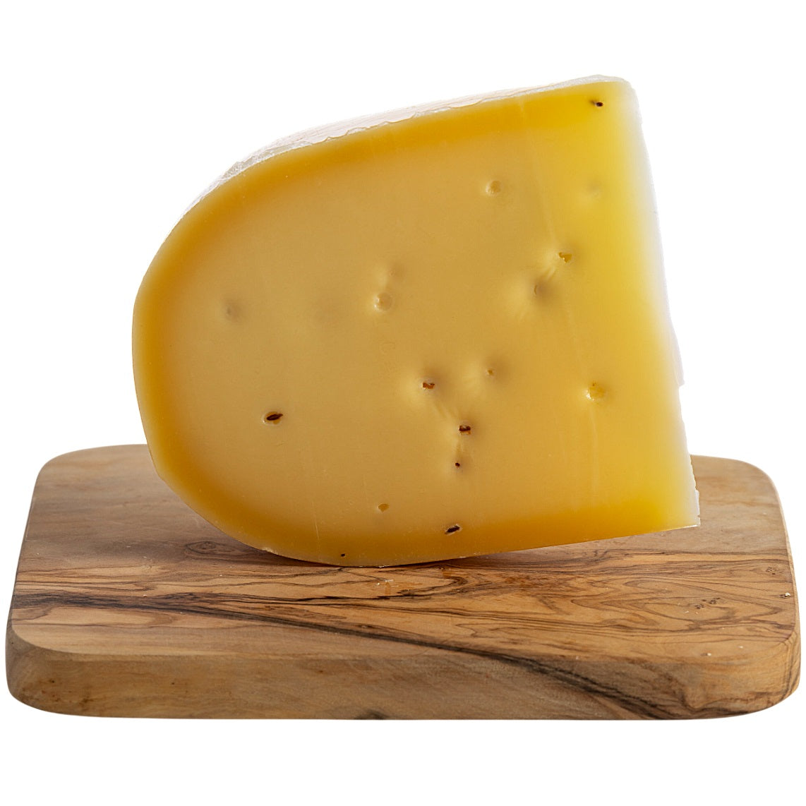 Gouda-style semi-hard artisan cow's cheese with whole caraway seeds on a white background.