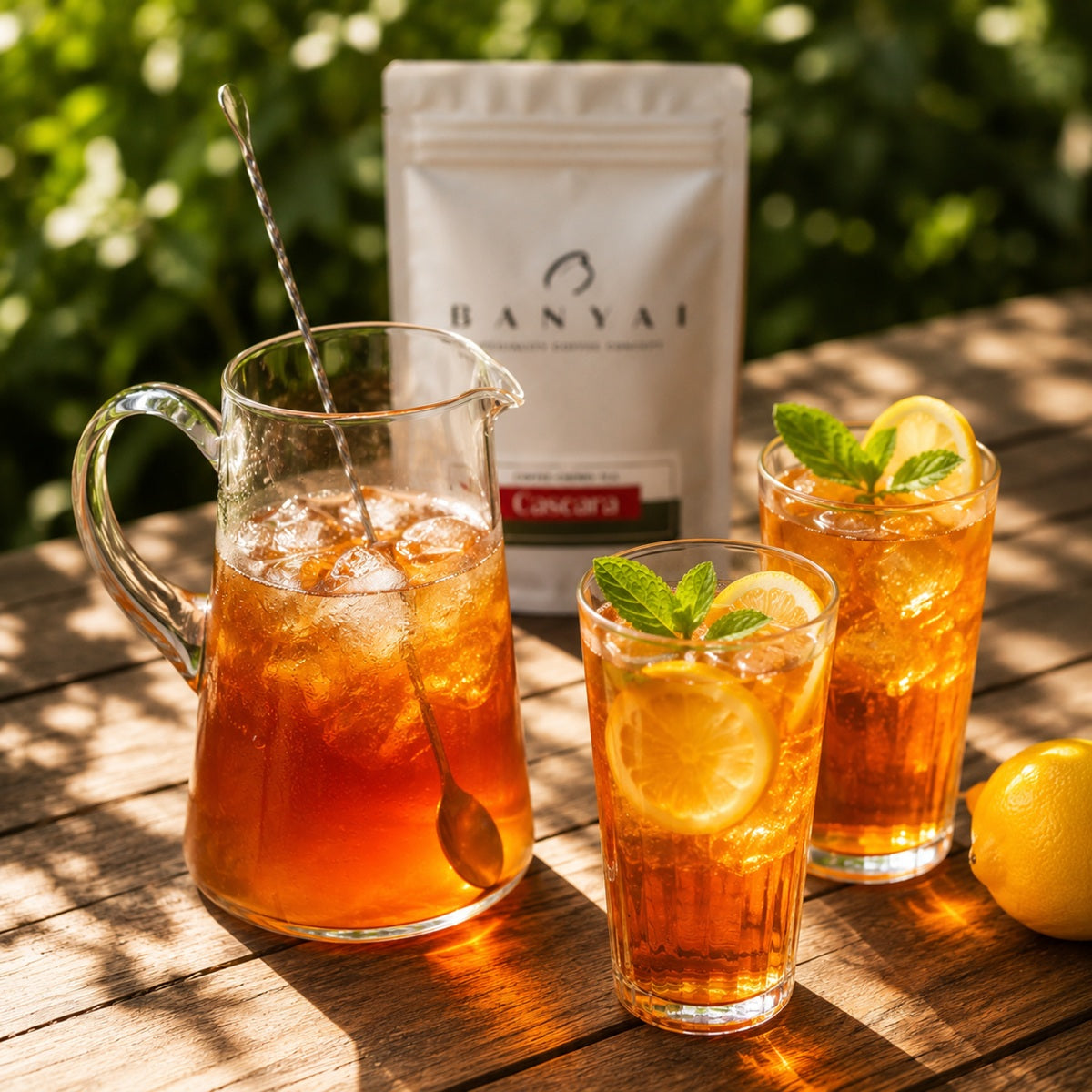 Cups of iced Cascara tea made from dried coffee cherries on a tabb.le in the sunshine