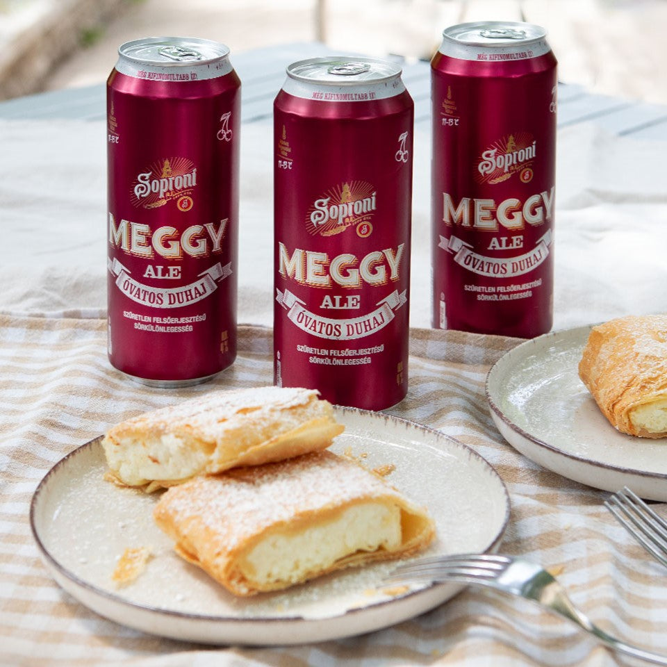 Cans of cherry flavoured beer fermented with fruit juice.
