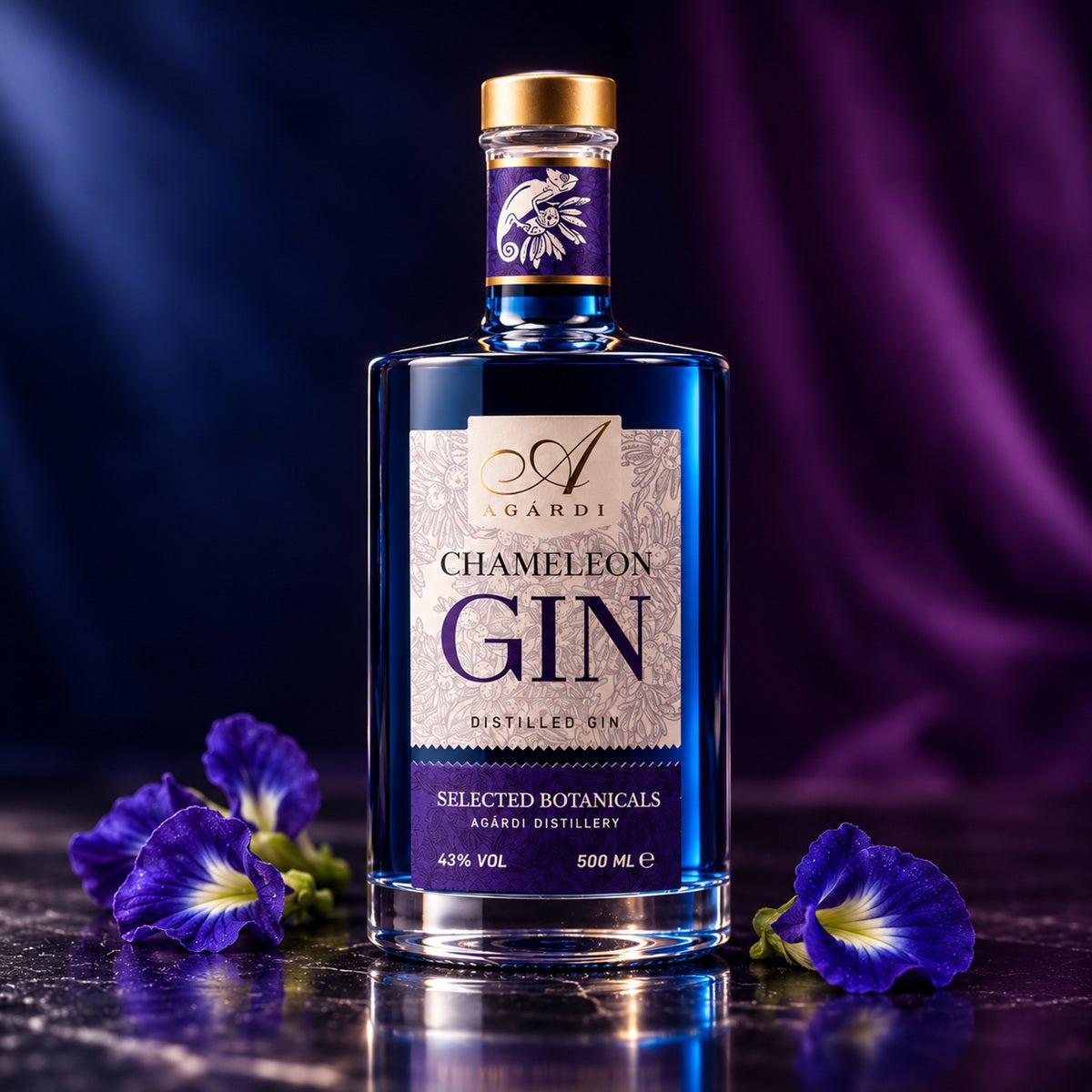 A bottle of Chameleon colour-changing gin with a clear sky-blue hue, surrounded by butterfly pea flowers.