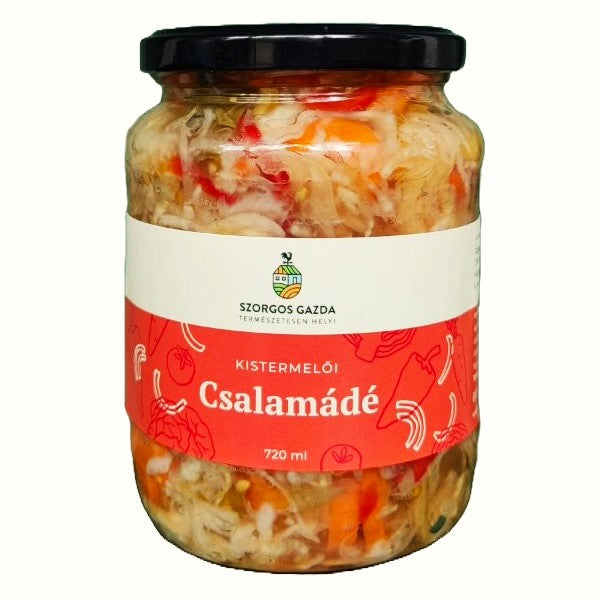 A jar of csalamádé, which are Hungarian pickled vegetables.