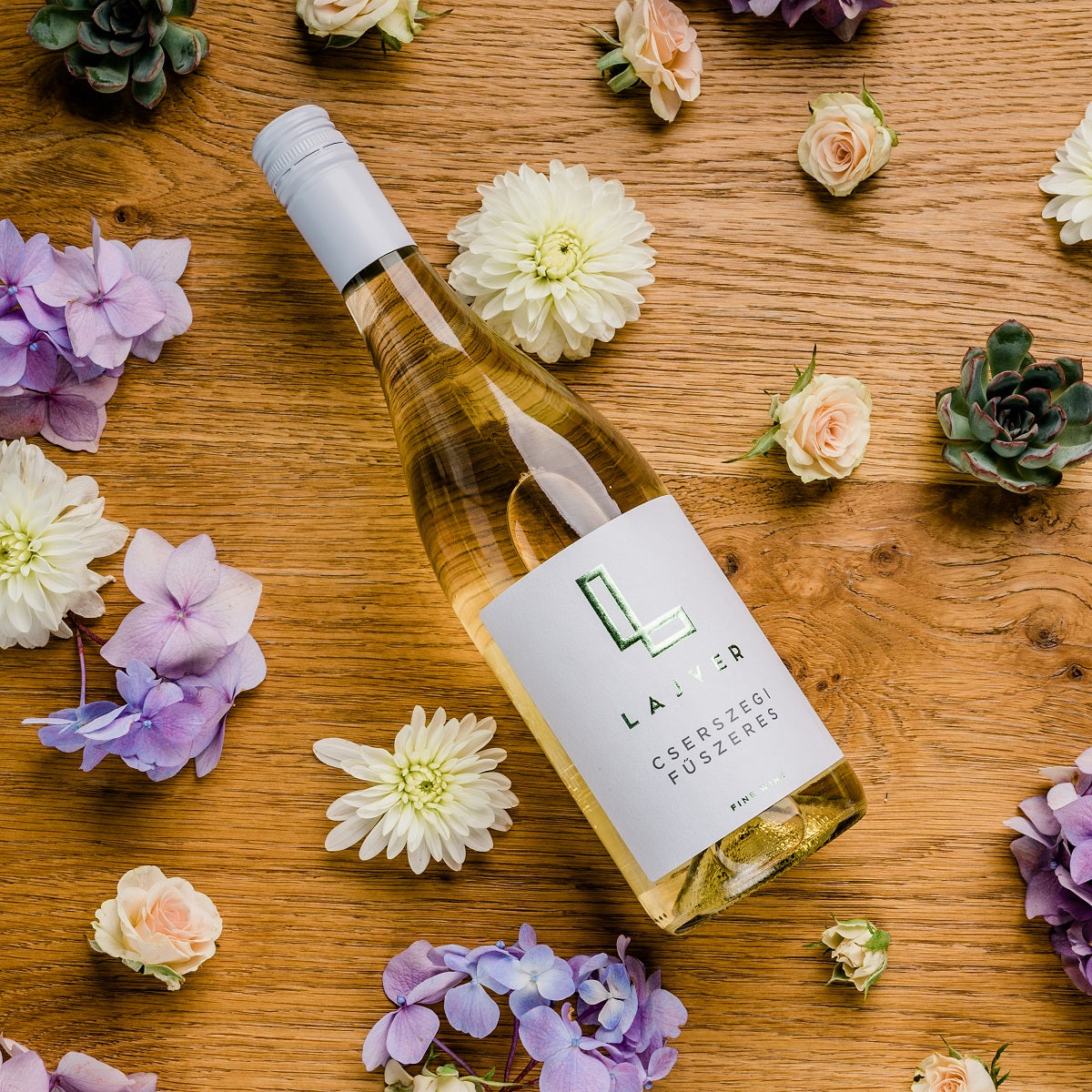 A bottle of Cserszegi Fűszeres  Hungarian dry wine from selected white grapes.