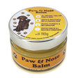 A tin of dog paw and nose balm.