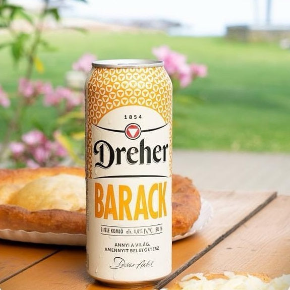 A can of juicy peach beer that combines a pale lager with a refreshing peach drink into a fruit ale.