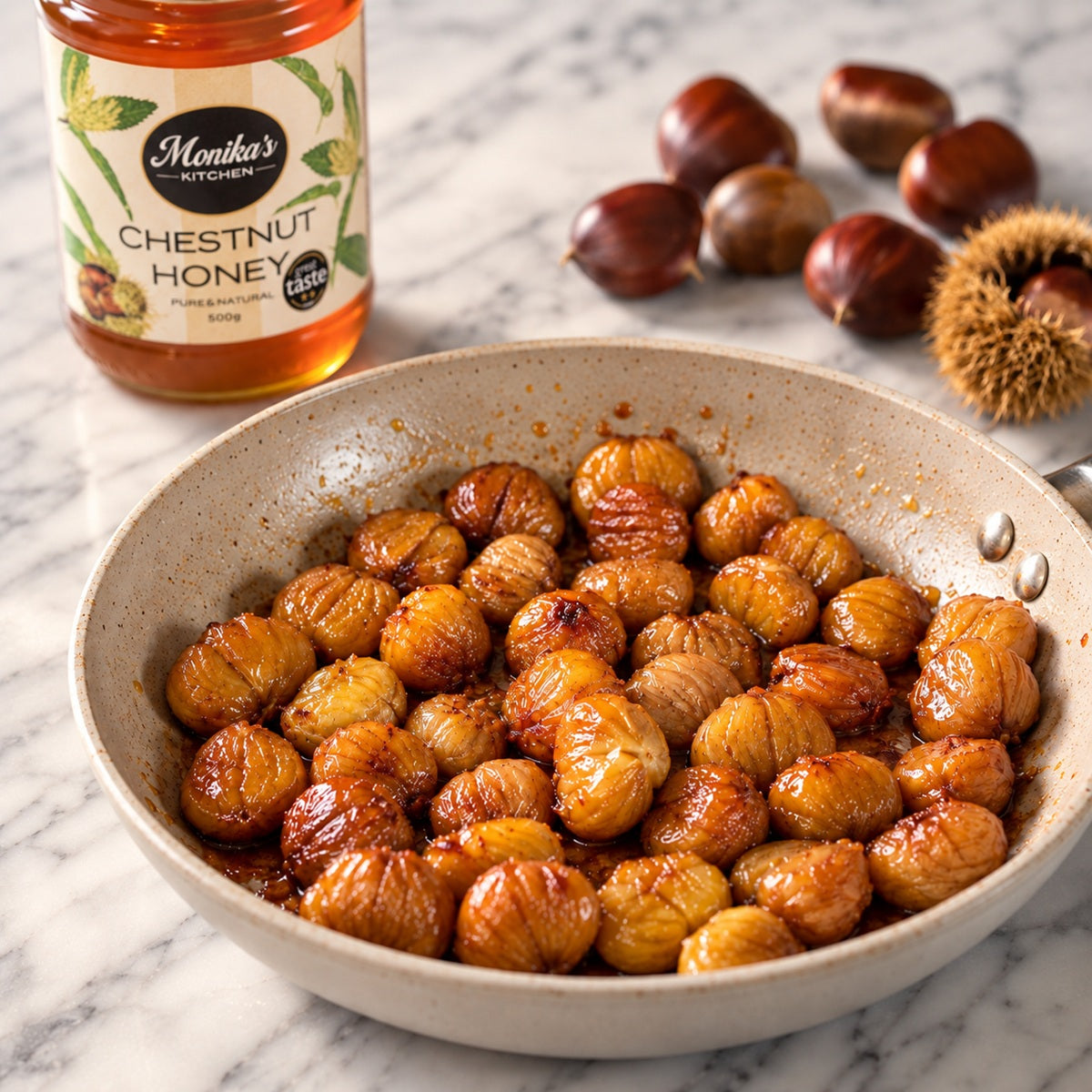 Pan of peeled, honey-roasted chestnuts, glazed in raw chestnut honey.