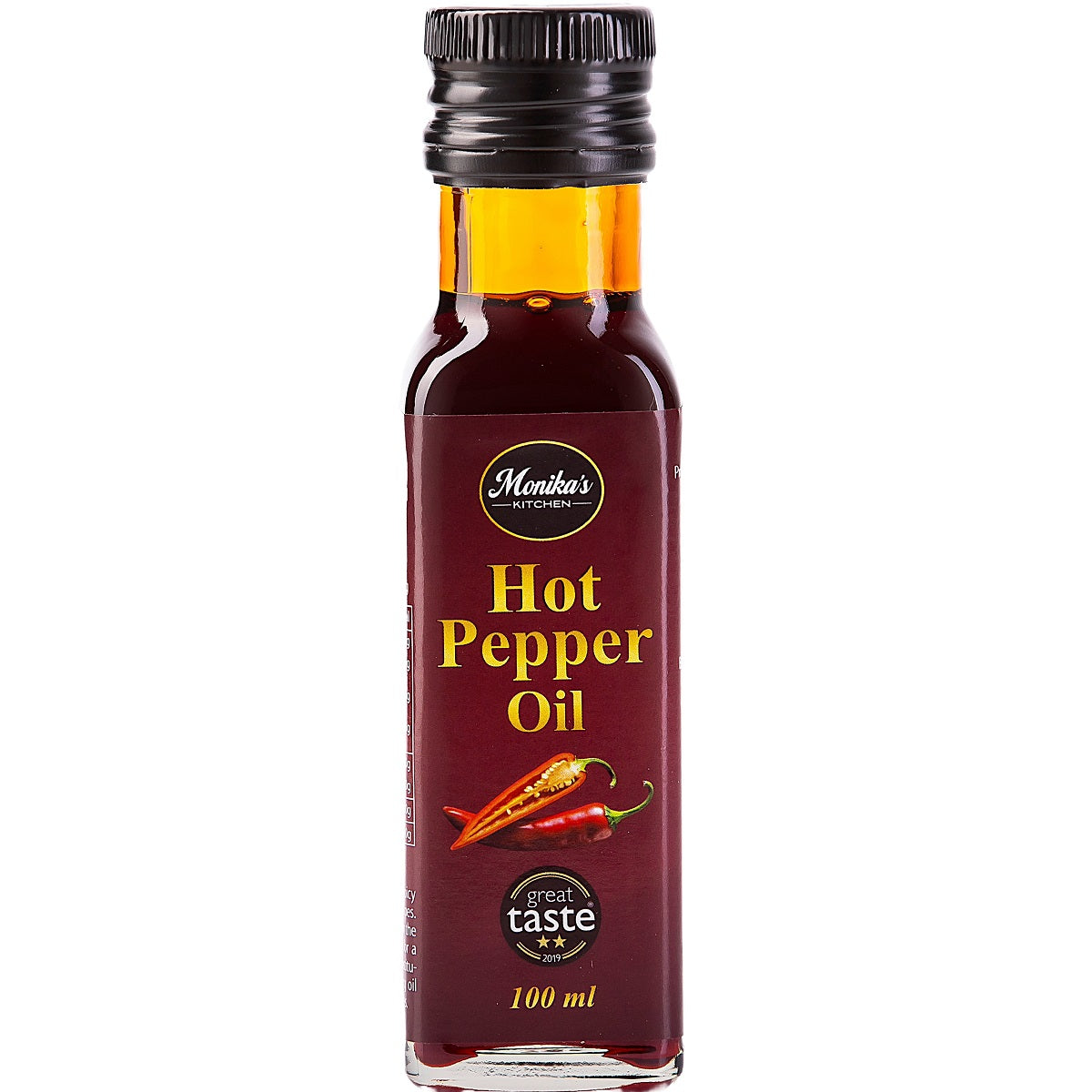 A bottle of hot pepper oil made from the best cold-pressed spicy chili paprika seeds.