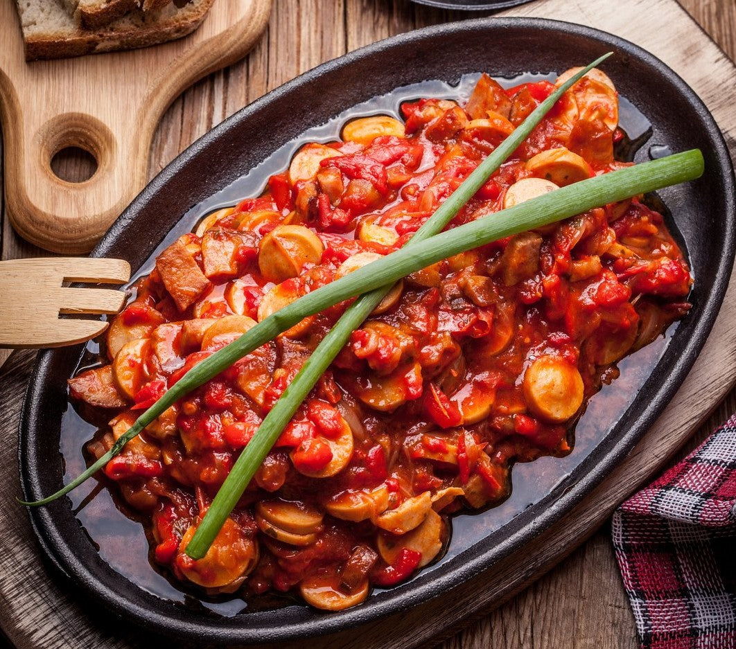 A Hungarian dish of lecso red pepper stew seasoned with organic sweet paprika powder.