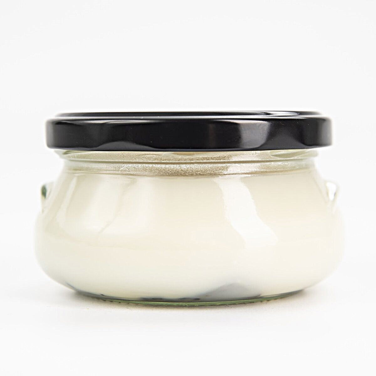 A jar of mangalitsa lard infused with black truffle slices.