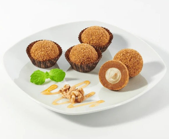 A plate of Marlenka classic honey nuggets with walnuts.