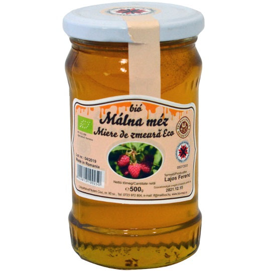 A jar of organic raspberry honey.