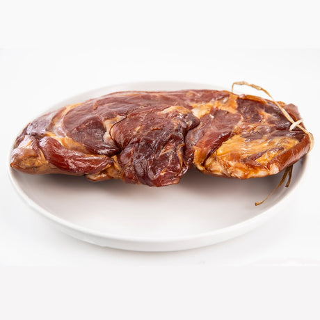 A piece of smoked pork ham hock.