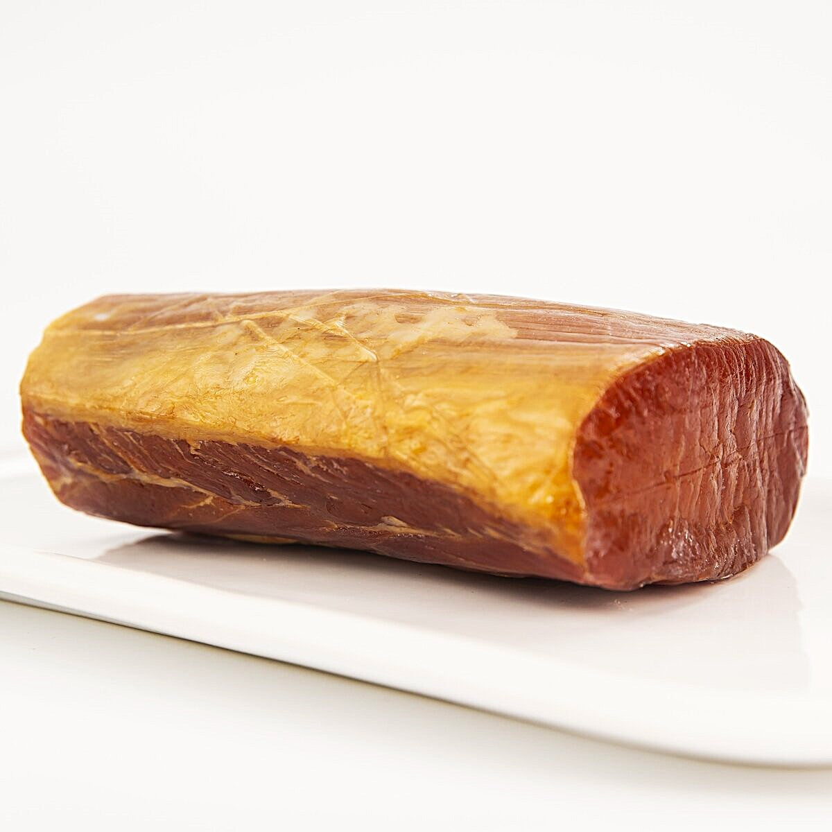A piece of smoked pork loin from cured fillet meat.