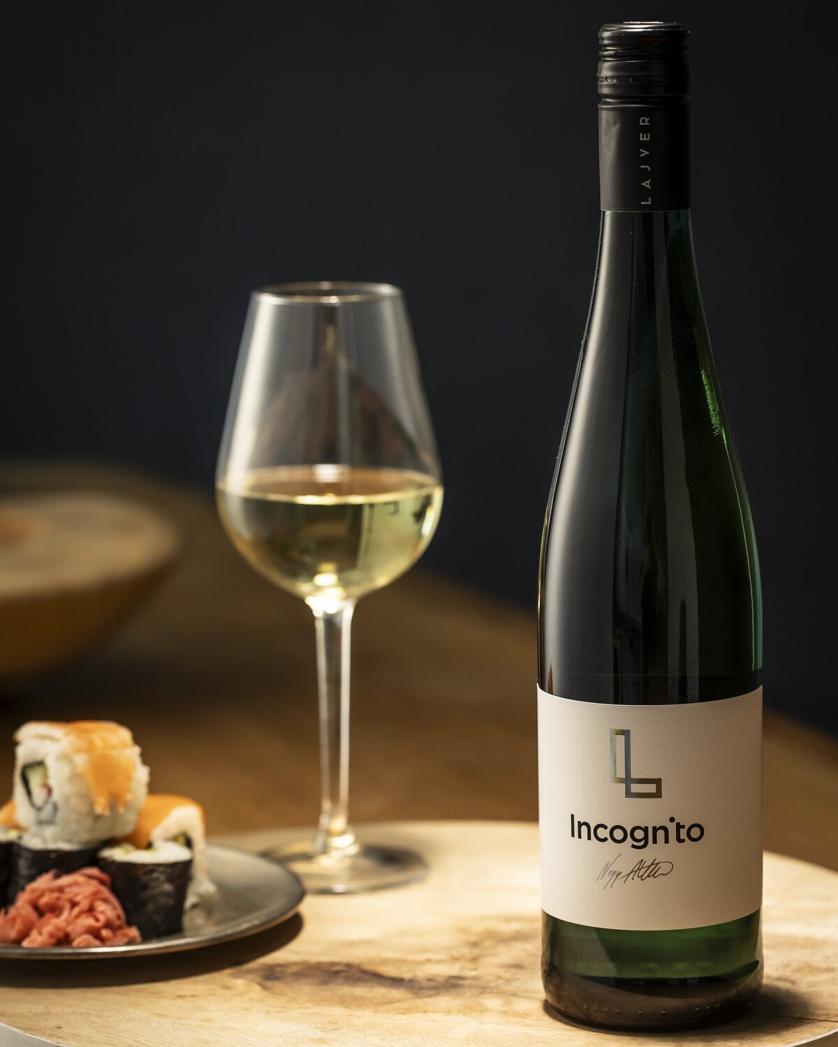 A glass of dry white wine, the best pairing for Sushi and spicy Asian dishes.