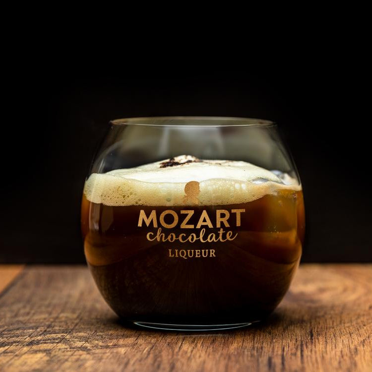 A glass of espresso martini, this simple recipe is made using creamy Mozart Gold chocolate liqueur.