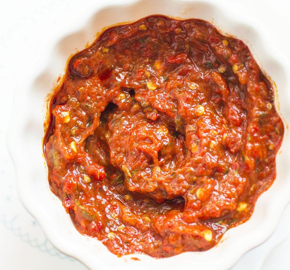 A spicy ajvar hot red pepper spread recipe made with Hungarian paprika seed oil.
