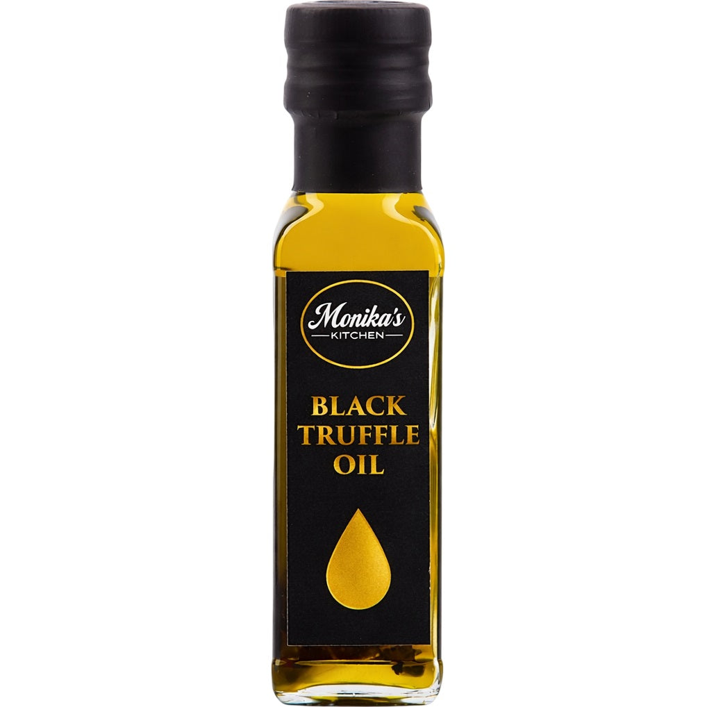 A bottle of black truffle oil from the best extra virgin olive oil infused with real truffle slices.