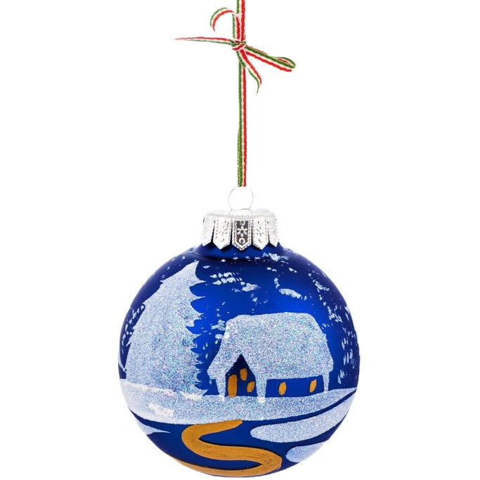 A large navy blue glass Christmas tree bauble decoration hand-painted with a winter scene.