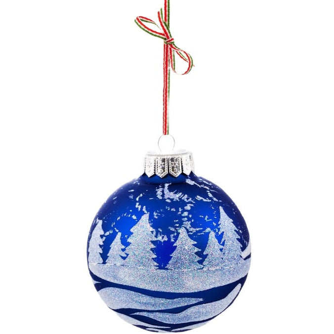 A large navy blue glass Christmas tree bauble decoration hand-painted with a festive winter landscape.