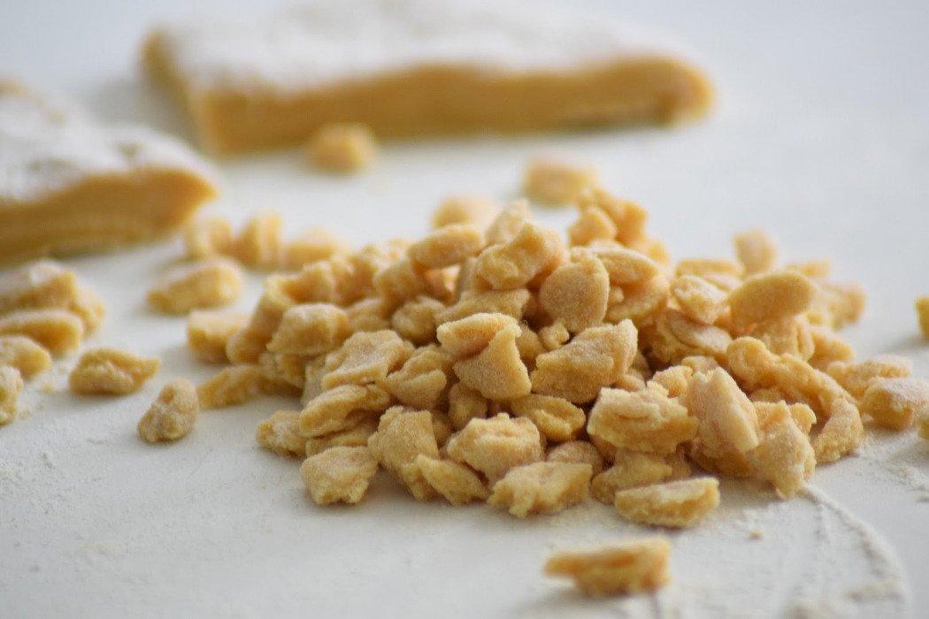 Fresh csipetke tészta, a traditional Hungarian pinched pasta noodle for soups.