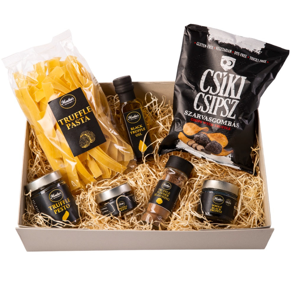 A deluxe black truffle hamper gift set with truffle infused oil, pesto, slices and truffle honey.