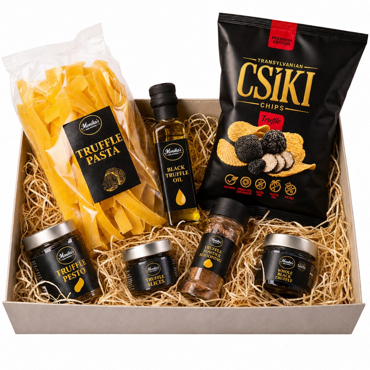 A deluxe black truffle hamper gift set with truffle infused oil, pesto, slices and truffle honey.