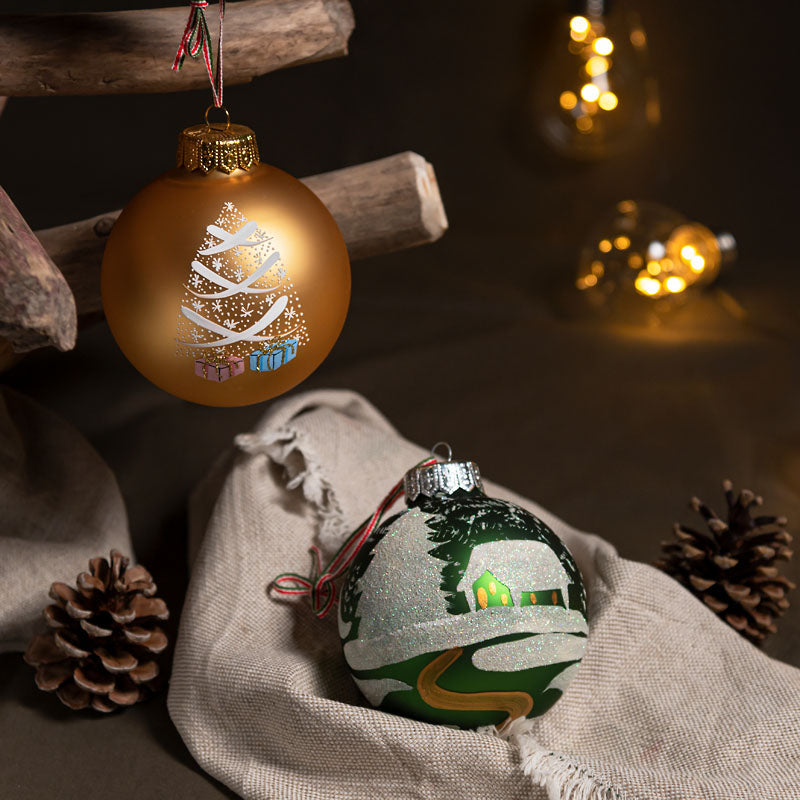 One forest green and one gold luxury hand painted Christmas tree baubles from glass.