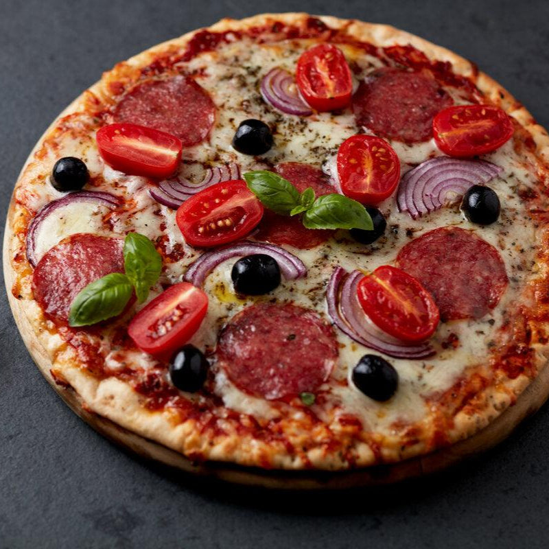 A keto pizza recipe, the gluten-free pizza base is made with ground sesame seed flour for a crispy crust high in protein.