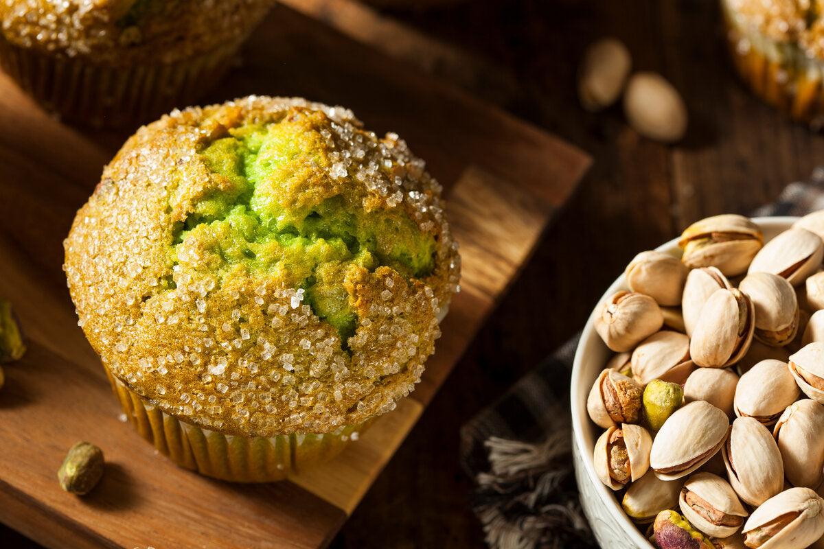 A gluten and wheat free muffin made with ground pistachio flour.