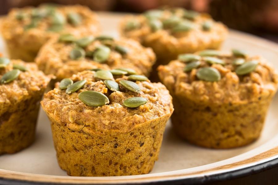 A healthy gluten-free pumpkin muffin recipe baked with pumpkin seed flour.