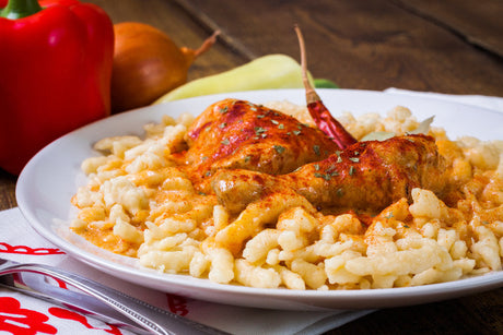 Chicken Paprikash recipe for cooking an authentic Hungarian paprikás csirke with sour cream and noodles.