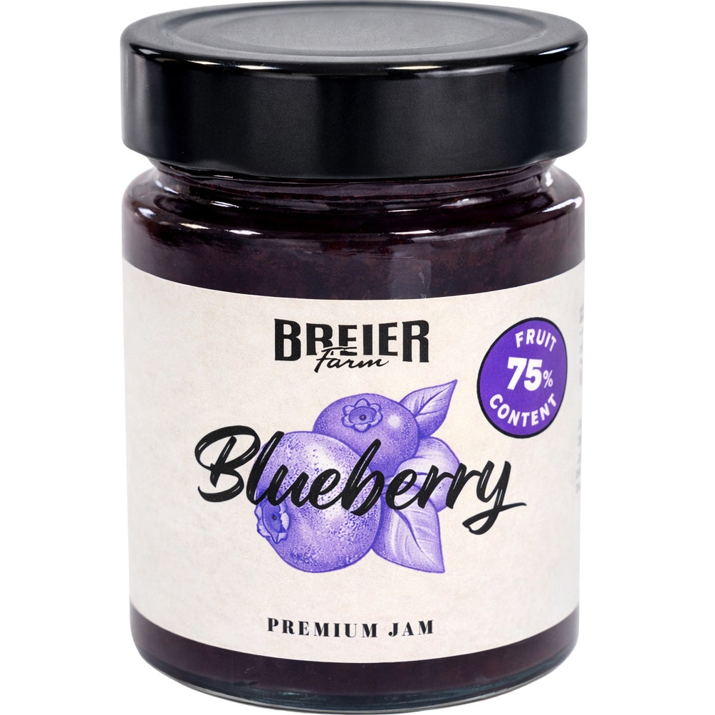 A jar of healthy low-sugar strawberry jam made with 75% fresh fruit.