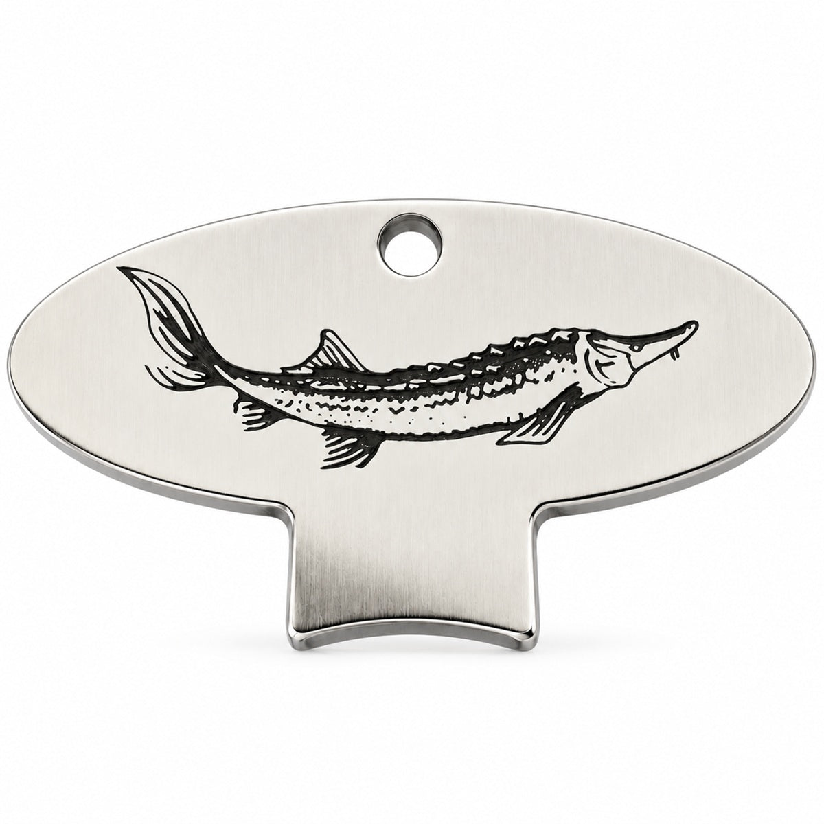 A polished metal caviar key with an engraved sturgeon design: an elegant tool for opening vacuum-sealed tins.