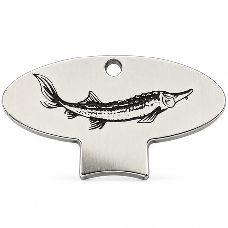 A polished metal caviar key with an engraved sturgeon design: an elegant tool for opening vacuum-sealed tins.
