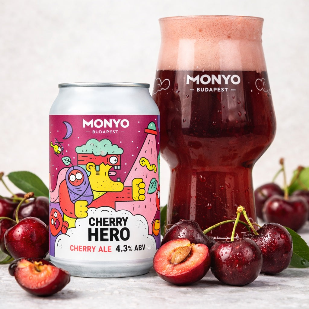 Can and a glass of cherry beer with fresh cherries in the foreground.
