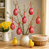 Easter egg tree with hand-painted red Easter egg decorations, which are stylish artisan ornaments.