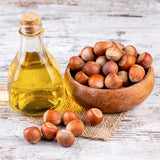 A jar of hazelnut oil, this cold-pressed cooking oil best used for drizzling over salads.