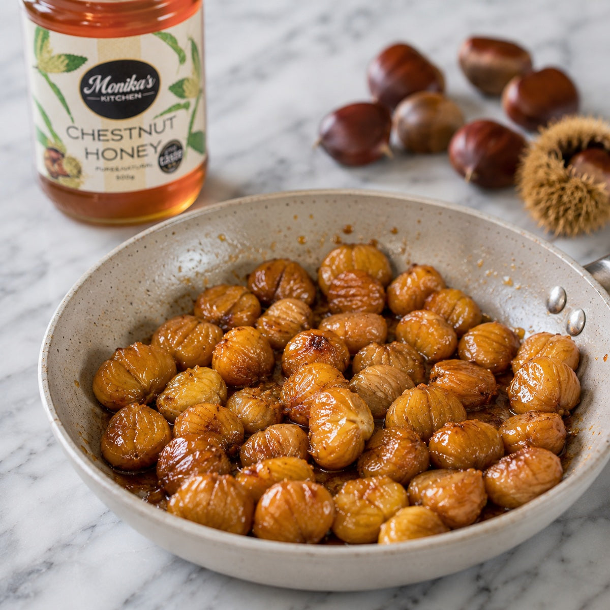 Pan of peeled, honey-roasted chestnuts, glazed in raw chestnut honey.