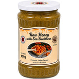 Jar of honey with sea buckthorn.