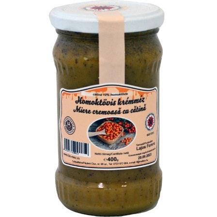 Jar of honey with sea buckthorn.