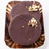 An traditional Ischler, which is a Linzer cookie covered in chocolate.