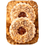 A pair of Linzer cookies, a traditional Austrian biscuit made with apricot jam.