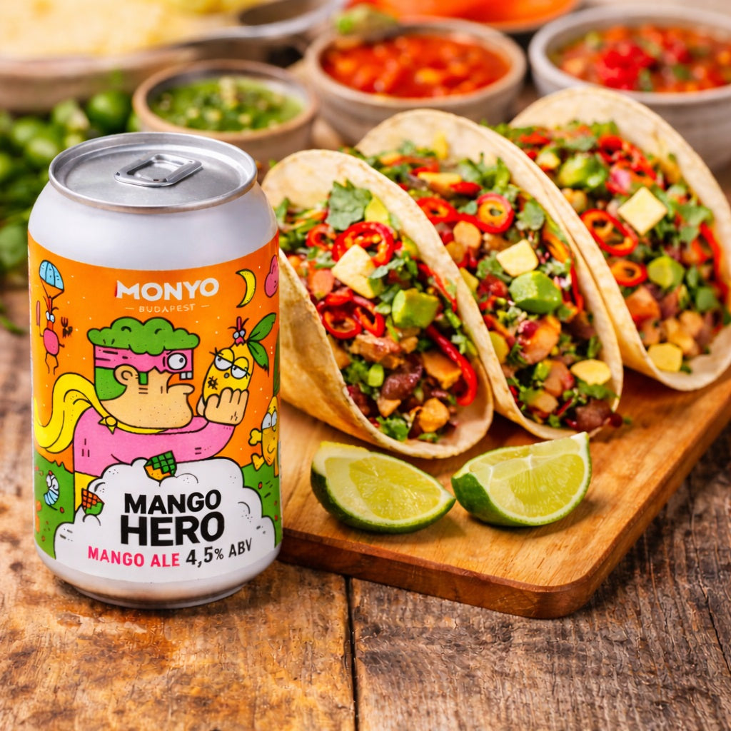 Can of mango beer with some tacos on a wooden board.