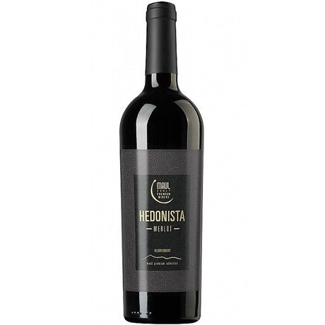 A bottle of Maul Hedonista, a Merlot red wine from the Villány region of Hungary.