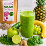 Healthy green smoothie made with fruits, vegetables and herbs, including milk thistle powder.
