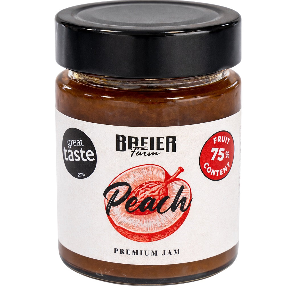 A jar of low-sugar peach jam, a premium preserve made with 75% fresh fruit.