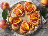 Peach puff pastry hearts made with fresh peaches and peach jam.