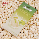 A pistachio chocolate bar coated in chocolate.