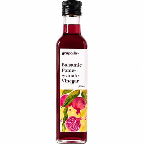 Bottle of Grapoila Pomegranate Balsamic Vinegar on a white background.